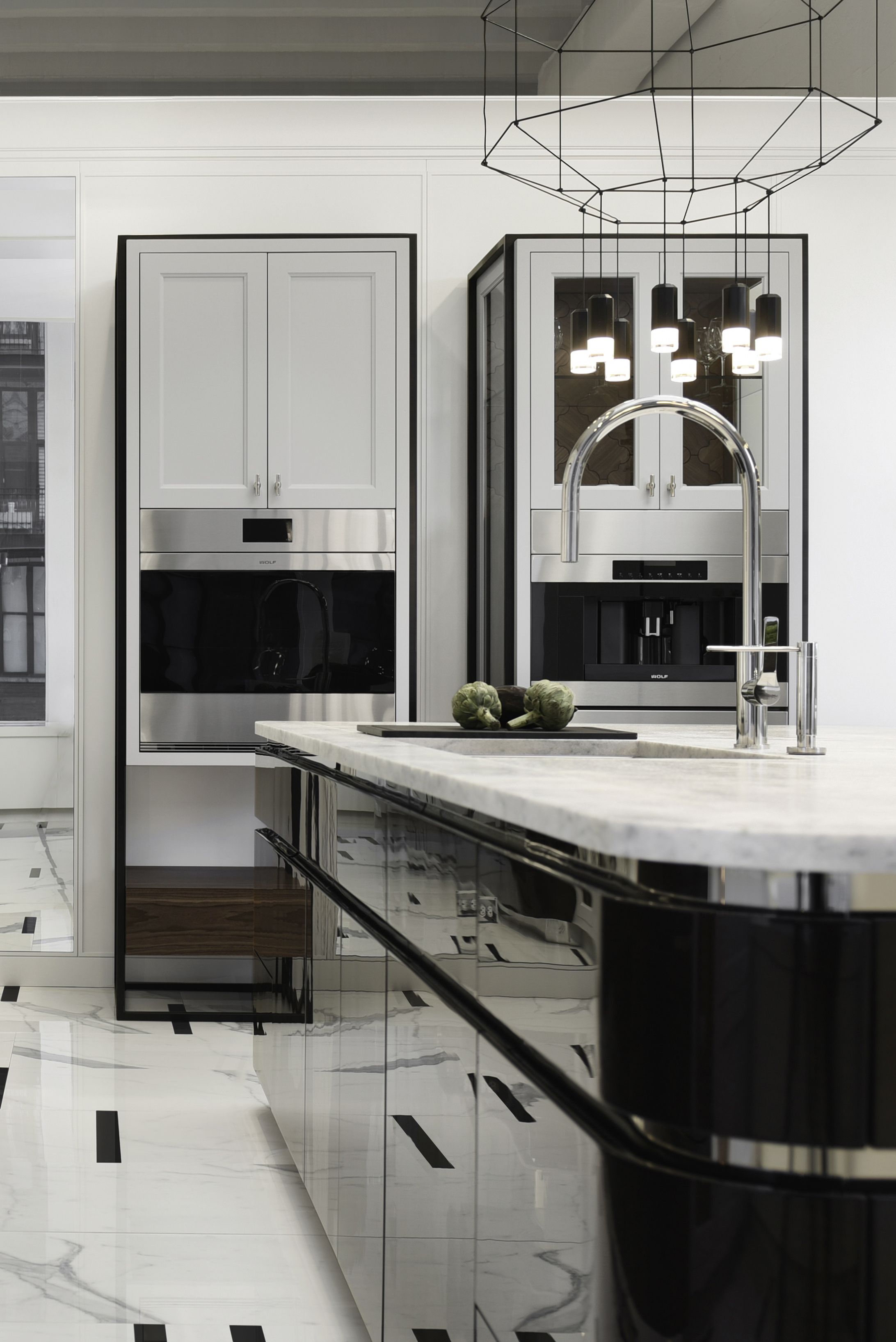 The beauty of our kitchen has been inspired by Old Hollywood glamour. The combination of wood, stone and metal as well as the use of touch-latch mechanism has allowed us to achieve a clean and sleek look.